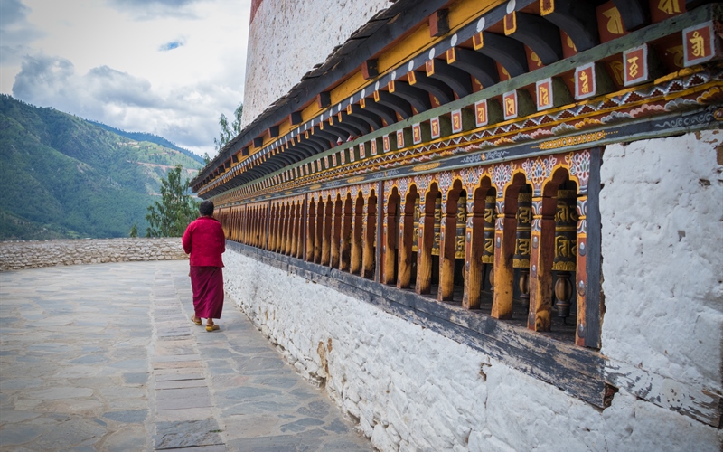 lady and prayer wheels changangkha lhakhang bhupen ghimiray